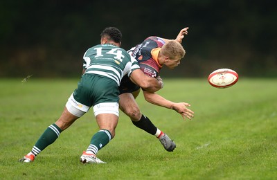 221016 - Dragons Premiership Select v Ealing - British & Irish Cup -Barney Nightingale of Dragons Premiership Select is tackled by Curtis Wilson of Ealing