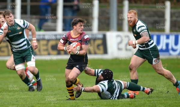 221016 - Dragons Premiership Select v Ealing - British & Irish Cup -Owen Davies of Dragons Premiership Select is tackled by Alex Penny of Ealing