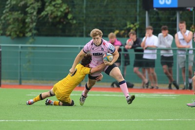 160826 - Dragons RFC U18 v Cardiff Rugby U18 - WRU Regional Age Grade Championship - Iestyn Stephens of Cardiff is tackled by Rafe Llewellyn of Dragons