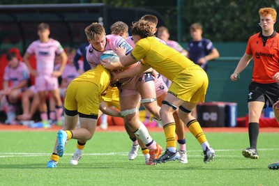 160826 - Dragons RFC U18 v Cardiff Rugby U18 - WRU Regional Age Grade Championship - Liam Williams of Cardiff is wrapped up by a strong defence