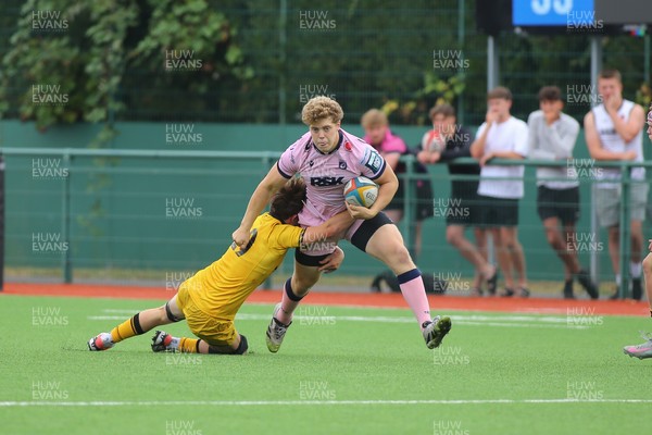 160826 - Dragons RFC U18 v Cardiff Rugby U18 - WRU Regional Age Grade Championship - Iestyn Stephens of Cardiff is tackled by Rafe Llewellyn of Dragons
