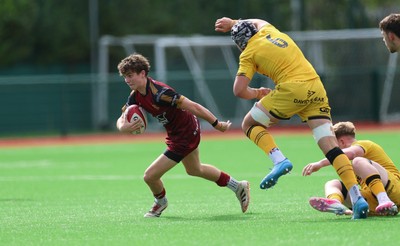 060926 - Dragons RFC U18 v RGC U18, WRU Regional Age Grade Championship - Lucas Jones of RGC takes on Jake Leighton of Dragons
