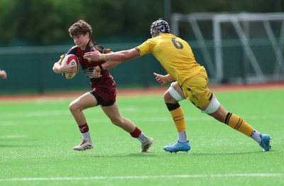 060926 - Dragons RFC U18 v RGC U18, WRU Regional Age Grade Championship - Lucas Jones of RGC takes on Jake Leighton of Dragons