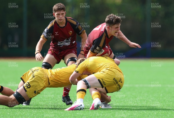 060926 - Dragons RFC U18 v RGC U18, WRU Regional Age Grade Championship - Riley Jones of RGC is tackled