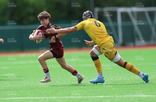 060926 - Dragons RFC U18 v RGC U18, WRU Regional Age Grade Championship - Lucas Jones of RGC takes on Jake Leighton of Dragons