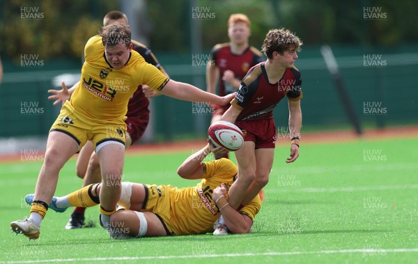 060926 - Dragons RFC U18 v RGC U18, WRU Regional Age Grade Championship - Lucas Jones of RGC takes on Jake Leighton of Dragons