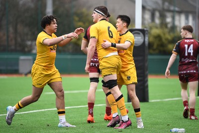 250126 - Dragons RFC U18 v RGC U18 - Troy Reymond of Dragons celebrates scoring a try with team mates