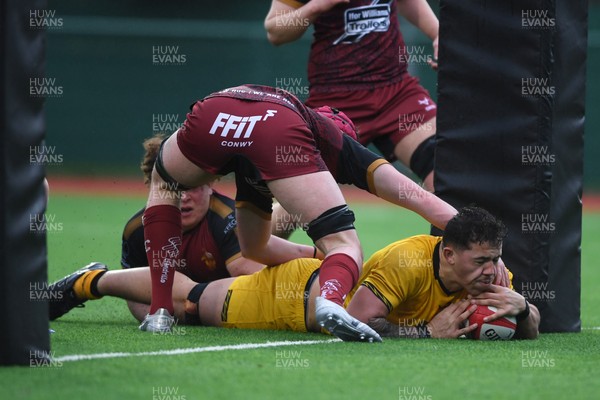 250126 - Dragons RFC U18 v RGC U18 - Elliot Bevan of Dragons scores a try