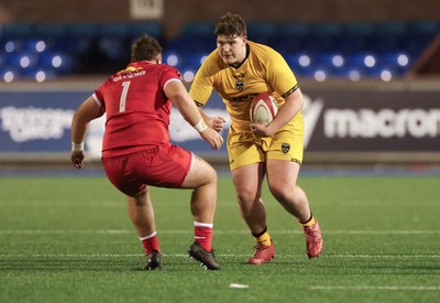 120226 - Dragons RFC U18 v Scarlets U18, WRU Regional Age Grade Championship 3rd and 4th place play off - Scott Crewe of Dragons takes on Ollie Tucker of Scarlets