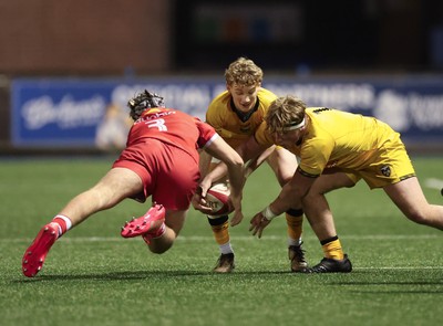 120226 - Dragons RFC U18 v Scarlets U18, WRU Regional Age Grade Championship 3rd and 4th place play off - Ciaran Beavis of Dragons and Felix Preece-Jones of Dragons compete with Dyfan Llewellyn of Scarlets for the ball