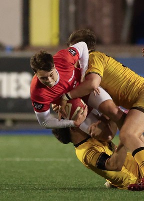 120226 - Dragons RFC U18 v Scarlets U18, WRU Regional Age Grade Championship 3rd and 4th place play off - Cole Inker of Scarlets is tackled