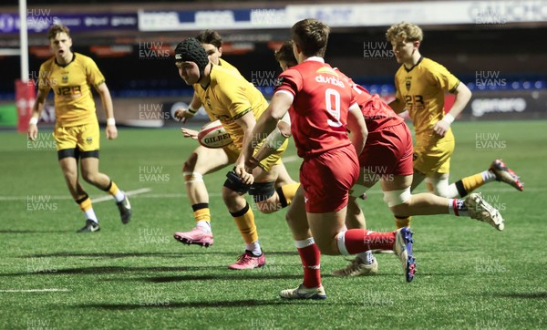 120226 - Dragons RFC U18 v Scarlets U18, WRU Regional Age Grade Championship 3rd and 4th place play off - Troy Raymond of Dragons breaks for the line