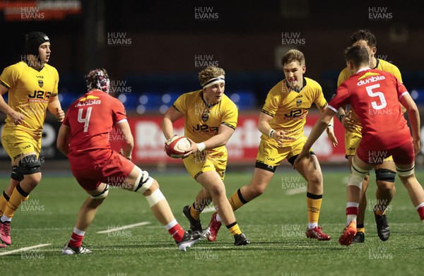 120226 - Dragons RFC U18 v Scarlets U18, WRU Regional Age Grade Championship 3rd and 4th place play off - Ciaran Beavis of Dragons takes on Rhys Owen of Scarlets and Hefin Hughes of Scarlets