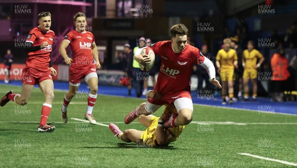 120226 - Dragons RFC U18 v Scarlets U18, WRU Regional Age Grade Championship 3rd and 4th place play off - Cole Inker of Scarlets is tackled short of the line by Brogan Leary of Dragons