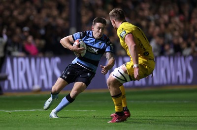 171025 - Dragons RFC v Cardiff Rugby - United Rugby Championship - Josh Adams of Cardiff is challenged by Shane Lewis-Hughes of Dragons 
