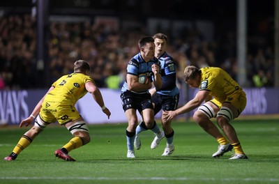 171025 - Dragons RFC v Cardiff Rugby - United Rugby Championship - Josh Adams of Cardiff is tackled by Ben Carter of Dragons 