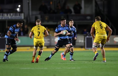 171025 - Dragons RFC v Cardiff Rugby - United Rugby Championship - George Nott of Cardiff is challenged by Ben Carter of Dragons 