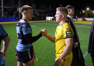 171025 - Dragons RFC v Cardiff Rugby - United Rugby Championship - Cameron Winnett of Cardiff and Harry Beddall of Dragons at full time