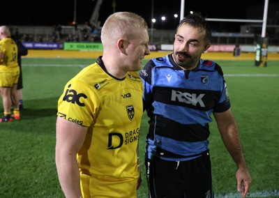 171025 - Dragons RFC v Cardiff Rugby - United Rugby Championship - Tinus de Beer of Dragons and Liam Belcher of Cardiff at full time