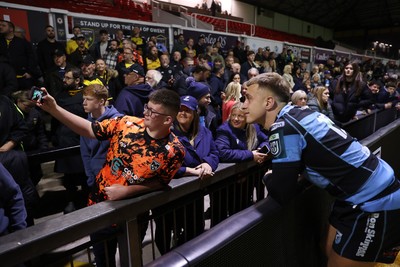 171025 - Dragons RFC v Cardiff Rugby - United Rugby Championship - Cameron Winnett of Cardiff with fans