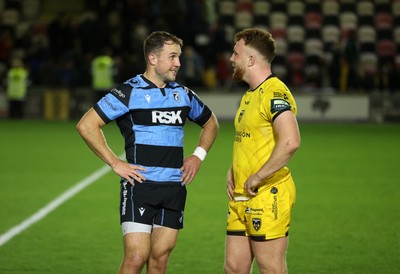 171025 - Dragons RFC v Cardiff Rugby - United Rugby Championship - Ioan Lloyd of Cardiff and Aneurin Owen of Dragons at full time