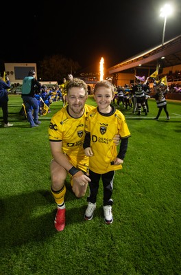 171025 - Dragons RFC v Cardiff Rugby - United Rugby Championship - Angus O�Brien of Dragons with mascot