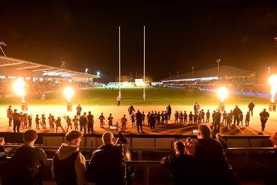 171025 - Dragons RFC v Cardiff Rugby - United Rugby Championship - Rodney Parade lit up with flames ahead of the match