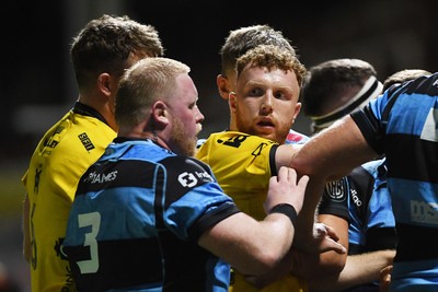 171025 - Dragons RFC v Cardiff Rugby - United Rugby Championship - Things heat up between Aneurin Owen of Dragons and Kieron Assiratti of Cardiff Rugby