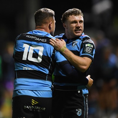 171025 - Dragons RFC v Cardiff Rugby - United Rugby Championship - Tom Bowen of Cardiff Rugby celebrates the win with Callum Sheedy of Cardiff Rugby at full time