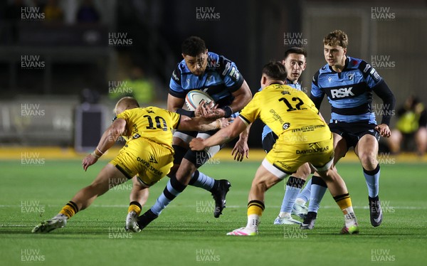 171025 - Dragons RFC v Cardiff Rugby - United Rugby Championship - Taulupe Faletau of Cardiff is tackled by Tinus de Beer of Dragons 