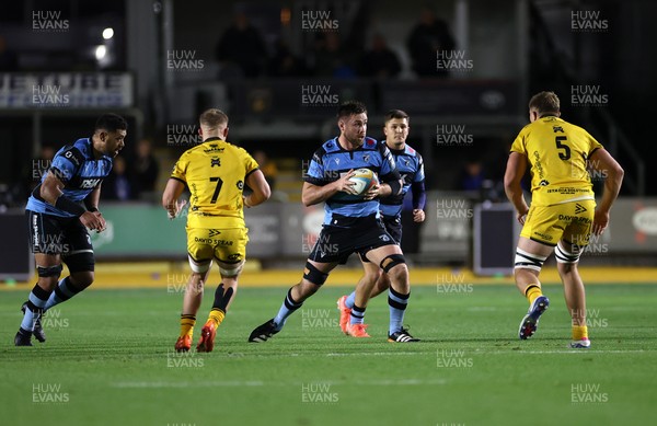 171025 - Dragons RFC v Cardiff Rugby - United Rugby Championship - George Nott of Cardiff is challenged by Ben Carter of Dragons 