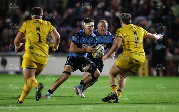 171025 - Dragons RFC v Cardiff Rugby - United Rugby Championship - Alex Mann of Cardiff is challenged by Brodie Coghlan of Dragons 