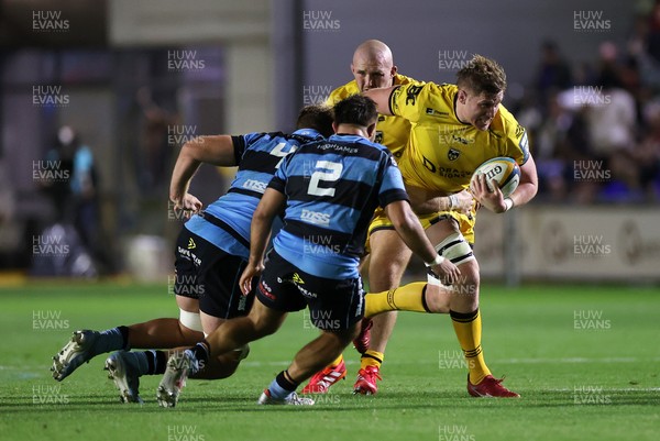 171025 - Dragons RFC v Cardiff Rugby - United Rugby Championship - Matthew Screech of Dragons is tackled by Josh McNally of Cardiff 