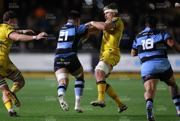 171025 - Dragons RFC v Cardiff Rugby - United Rugby Championship - Taine Basham of Cardiff is challenged by Aaron Wainwright of Dragons 