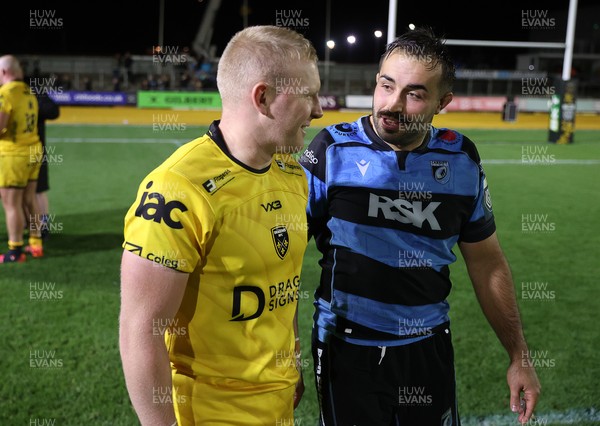 171025 - Dragons RFC v Cardiff Rugby - United Rugby Championship - Tinus de Beer of Dragons and Liam Belcher of Cardiff at full time