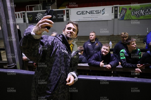 171025 - Dragons RFC v Cardiff Rugby - United Rugby Championship - Rhodri Williams of Dragons with fans at full time