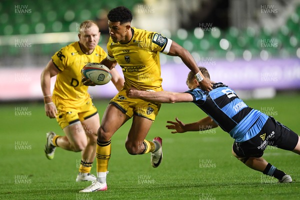 171025 - Dragons RFC v Cardiff Rugby - United Rugby Championship - Rio Dyer of Dragons is challenged by Aled Davies of Cardiff Rugby
