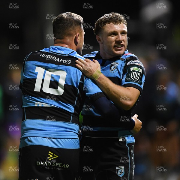 171025 - Dragons RFC v Cardiff Rugby - United Rugby Championship - Tom Bowen of Cardiff Rugby celebrates the win with Callum Sheedy of Cardiff Rugby at full time