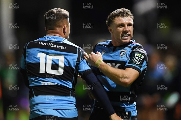 171025 - Dragons RFC v Cardiff Rugby - United Rugby Championship - Tom Bowen of Cardiff Rugby celebrates the win with Callum Sheedy of Cardiff Rugby at full time