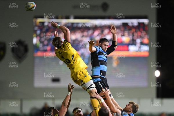 171025 - Dragons RFC v Cardiff Rugby - United Rugby Championship - George Nott of Cardiff Rugby  is challenged by Mathew Screech of Dragons