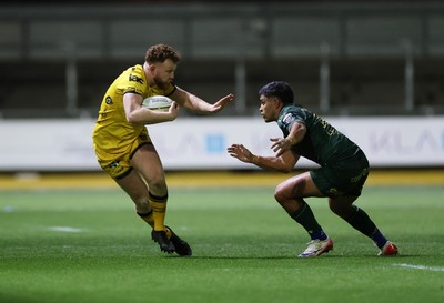 201225 - Dragons RFC v Connacht - United Rugby Championship - Aneurin Owen of Dragons breaks past Josh Ioane of Connacht 