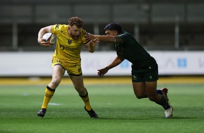 201225 - Dragons RFC v Connacht - United Rugby Championship - Aneurin Owen of Dragons breaks past Josh Ioane of Connacht 