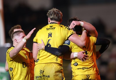 201225 - Dragons RFC v Connacht - United Rugby Championship - Che Hope of Dragons celebrates scoring a try with team mates