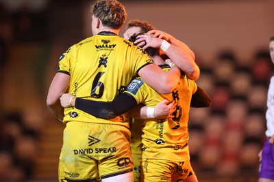 201225 - Dragons RFC v Connacht - United Rugby Championship - Che Hope of Dragons celebrates scoring a try with team mates