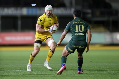201225 - Dragons RFC v Connacht - United Rugby Championship - Harrison Keddie of Dragons is challenged by Josh Ioane of Connacht 