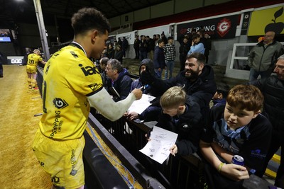201225 - Dragons RFC v Connacht - United Rugby Championship - Rio Dyer of Dragons with fans at full time