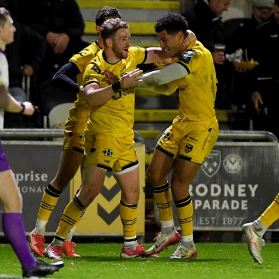 201225 - Dragons RFC v Connacht - United Rugby Championship - Rio Dyer of Dragons celebrates scoring a try with team mates