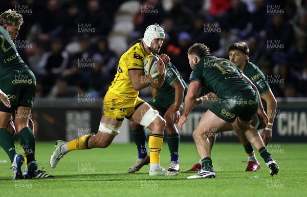 201225 - Dragons RFC v Connacht - United Rugby Championship - Harrison Keddie of Dragons is challenged by Cathal Forde of Connacht 