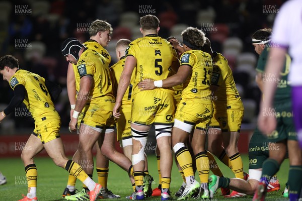 201225 - Dragons RFC v Connacht - United Rugby Championship - Oli Burrows of Dragons celebrates scoring a try with team mates