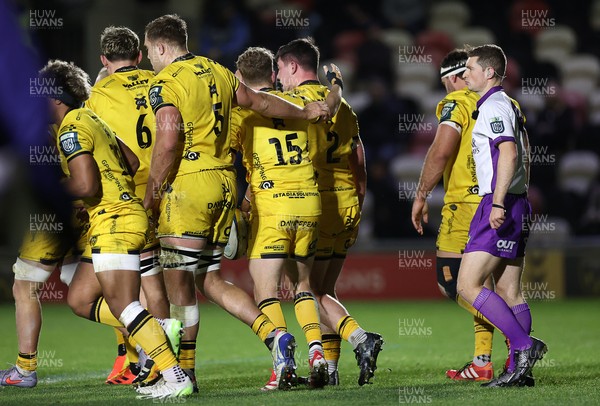 201225 - Dragons RFC v Connacht - United Rugby Championship - Oli Burrows of Dragons celebrates scoring a try with team mates